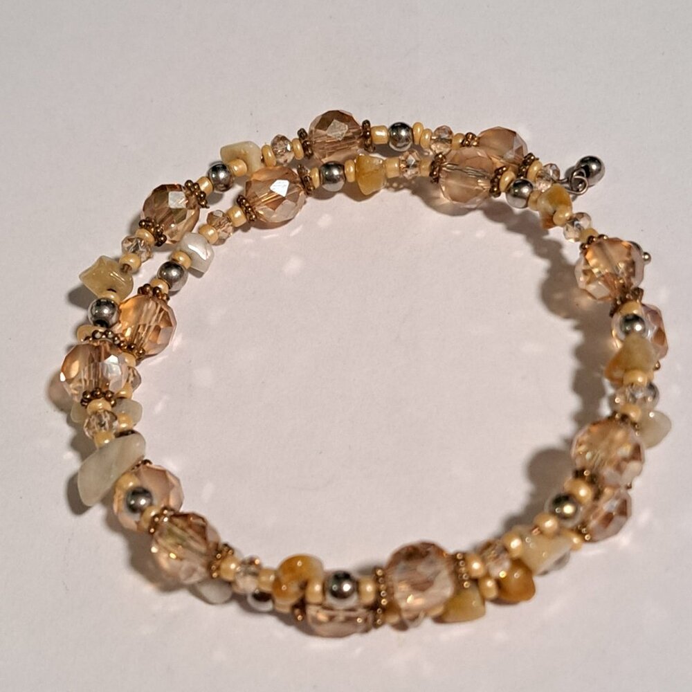 open spiral bracelet with silver tan yellow beige beads